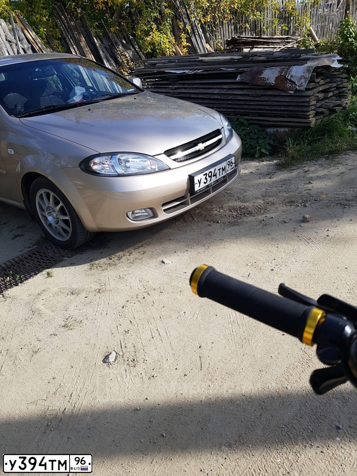 Фото автомобиля CHEVROLET LACETTI, 2012 — госномер У394ТМ96. Цвет: БЕЖЕВЫЙ