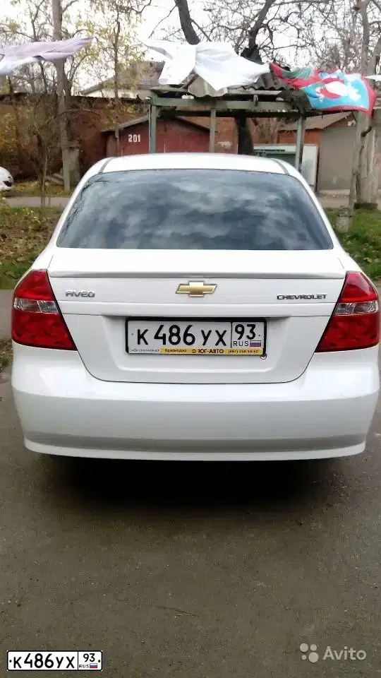 Фото автомобиля CHEVROLET AVEO, 2011 — госномер К486УХ93. Цвет: БЕЛЫЙ