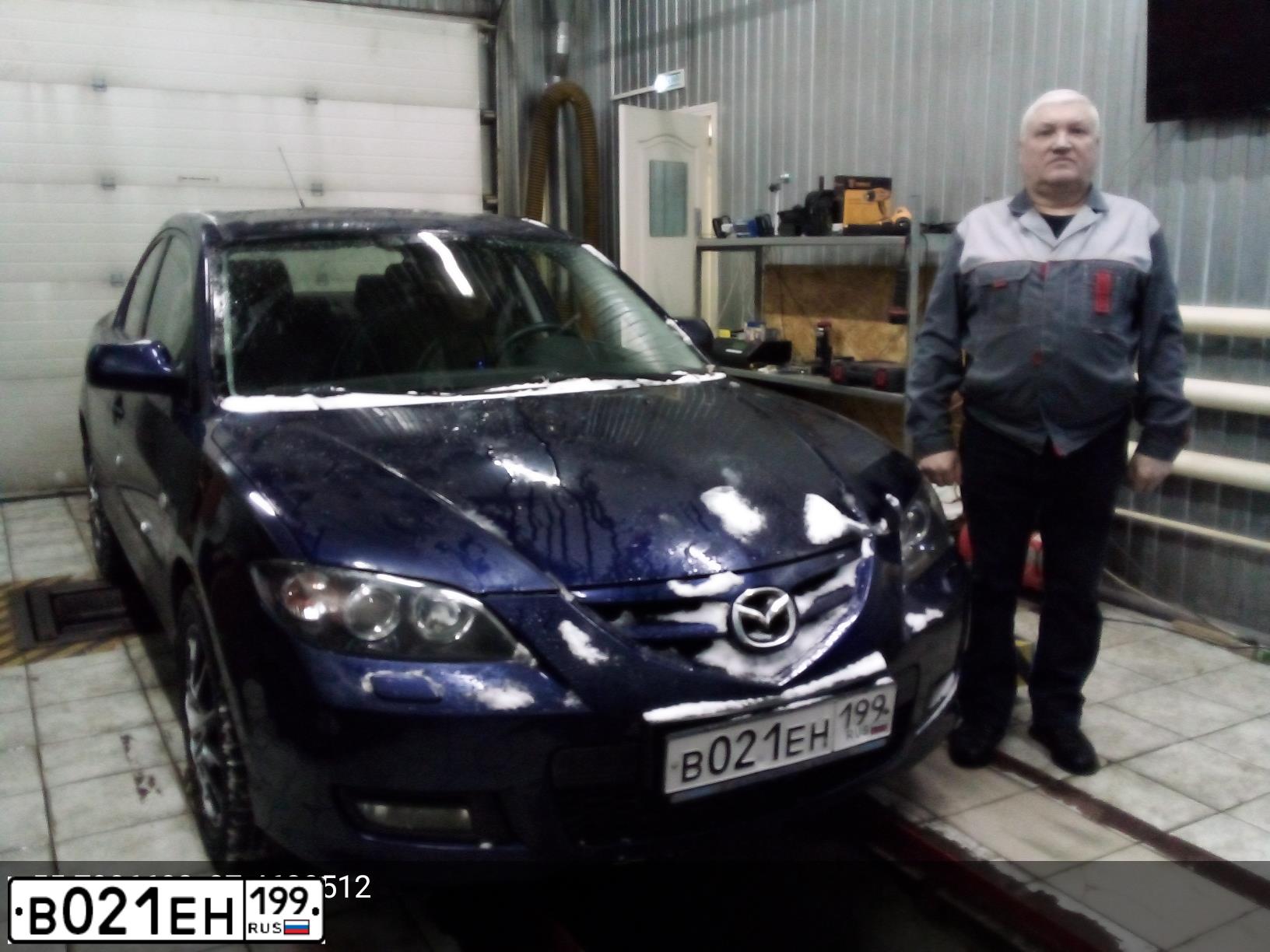 Фото автомобиля MAZDA 3, 2008 — госномер О795РХ29. Цвет: Темно-синий