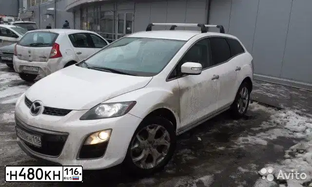 Фото автомобиля MAZDA CX-7, 2010 — госномер О156ВХ702. Цвет: Белый