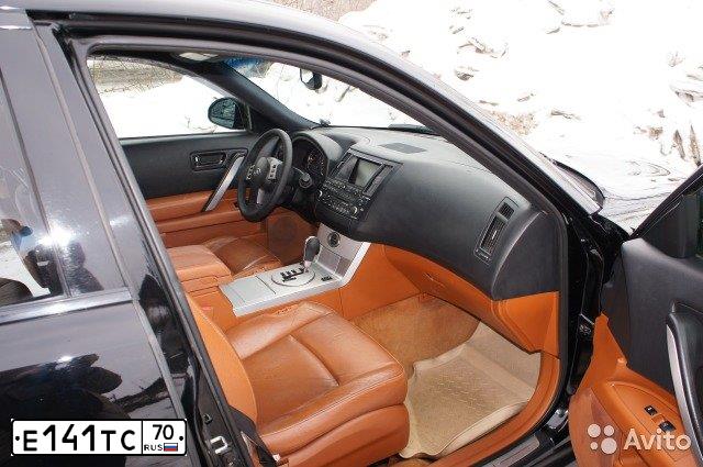 Фото автомобиля INFINITI QX70 /FX/, 2003 — госномер Е141ТС70. Цвет: ЧЕРНЫЙ
