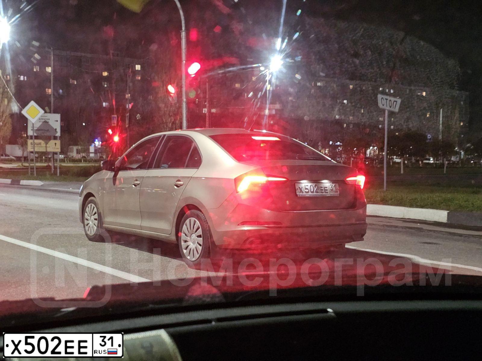 Фото автомобиля SKODA RAPID, 2021 — госномер Х502ЕЕ31. Цвет: Коричневый