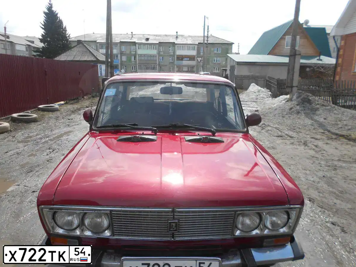 Фото автомобиля ВАЗ2106, 2000 — госномер Е401КХ55. Цвет: СЕРЕБРИСТЫЙ КРАСНЫЙ