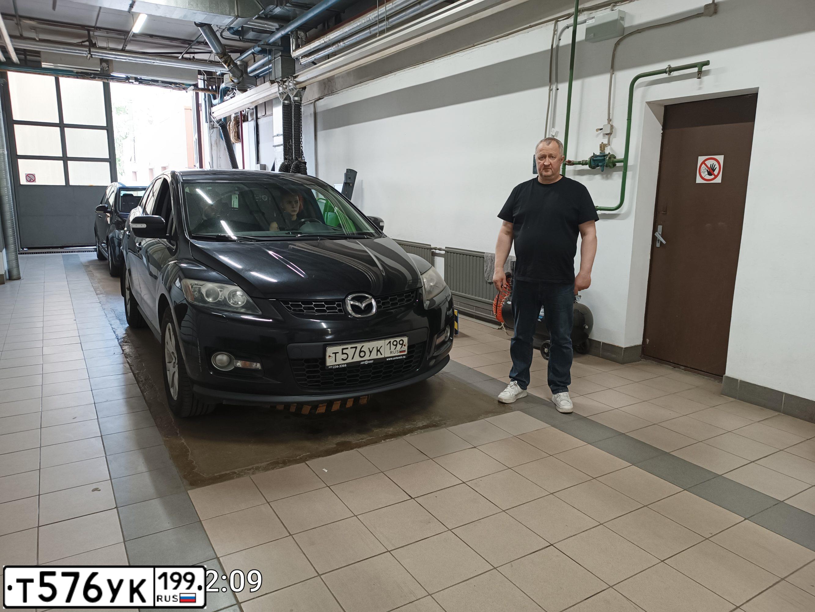 Фото автомобиля MAZDA CX-7, 2008 — госномер Т576УК199. Цвет: ЧЕРНЫЙ