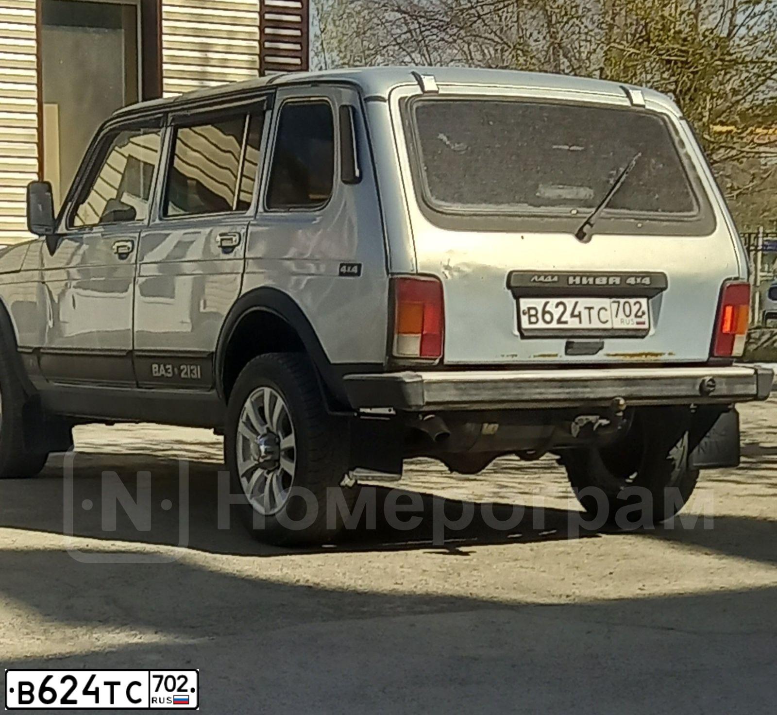 Фото автомобиля LADA 2131 NIVA, 2006 — госномер К344УС174. Цвет: Серебристо-желто-голубой