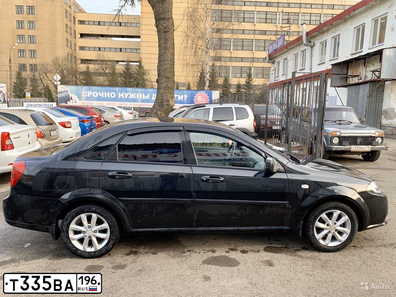 Фото автомобиля MITSUBISHI OUTLANDER, 2004 — госномер Т335ВА196. Цвет: ЧЕРНЫЙ