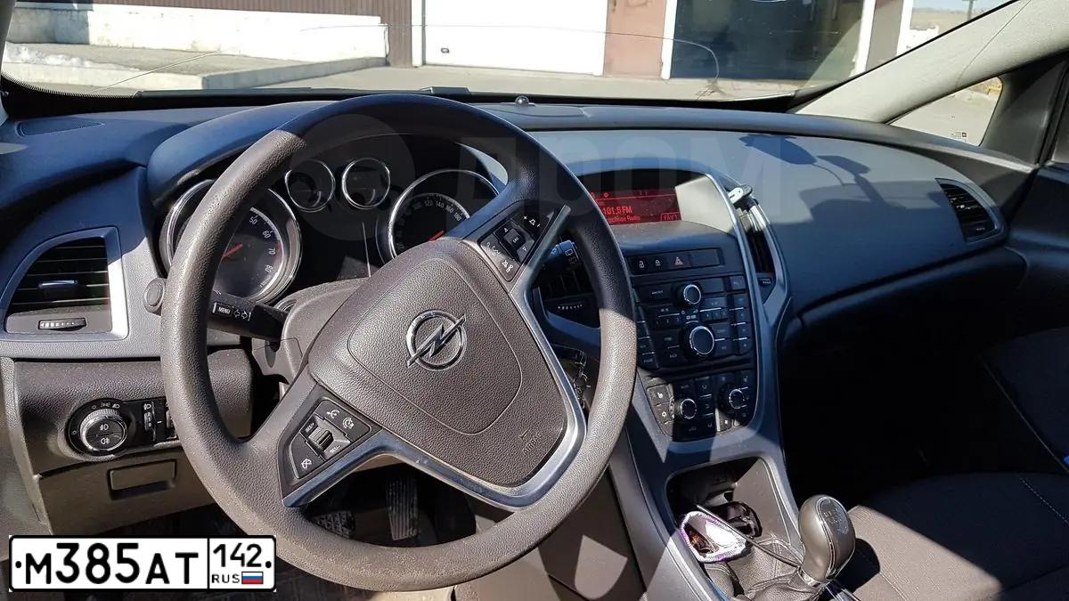 Фото автомобиля OPEL ASTRA, 2011 — госномер В426НЕ702. Цвет: СЕРО-ЗЕЛЕНЫЙ