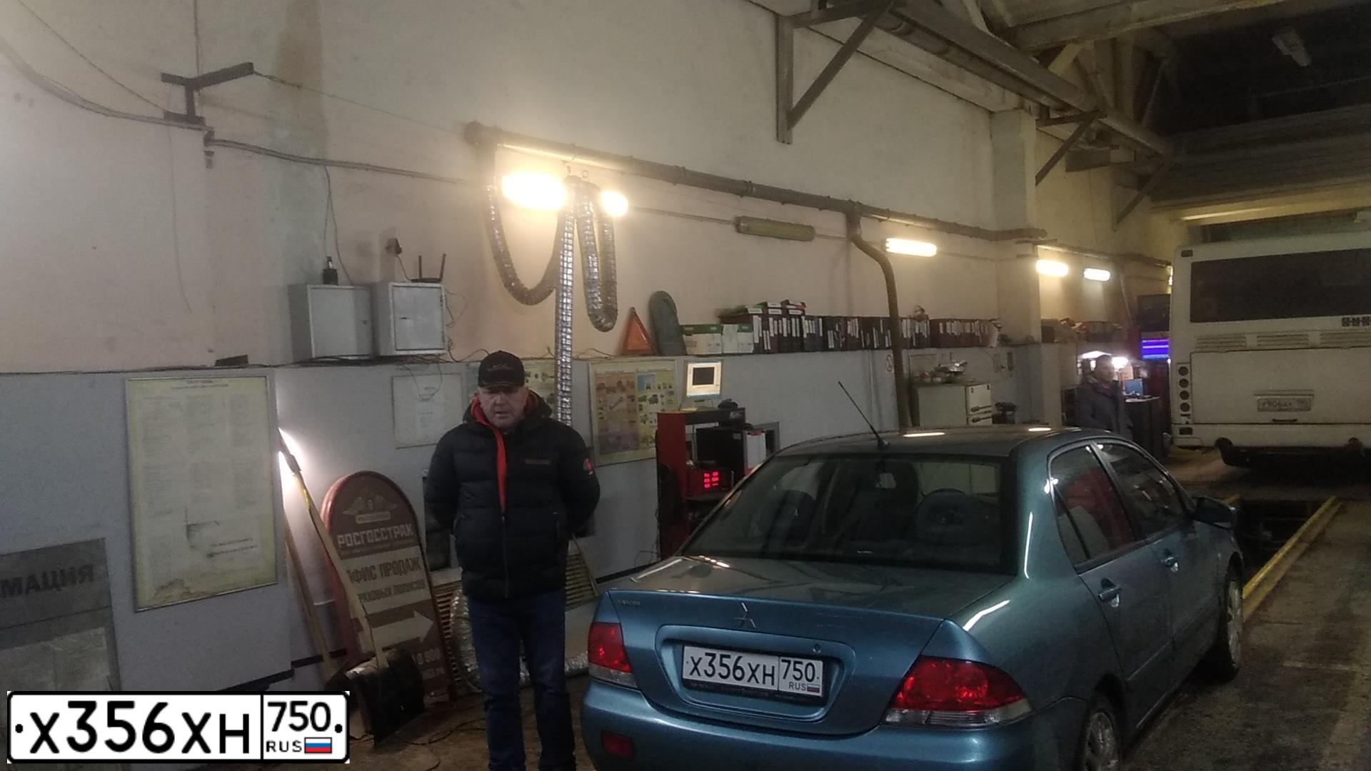 Фото автомобиля MITSUBISHI LANCER, 2006 — госномер Х505ХР198. Цвет: СВЕТЛО-СЕРО-ЗЕЛЕНЫЙ