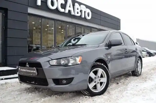 Фото автомобиля MITSUBISHI LANCER, 2007 — госномер В379ВУ18. Цвет: Серый