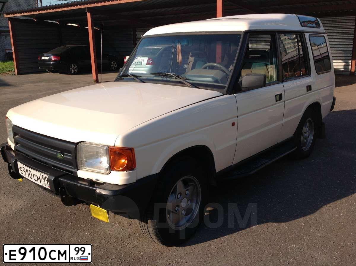 Фото автомобиля LANDROVER DISCOVERY, 1991 — госномер Е910СМ99. Цвет: БЕЛЫЙ