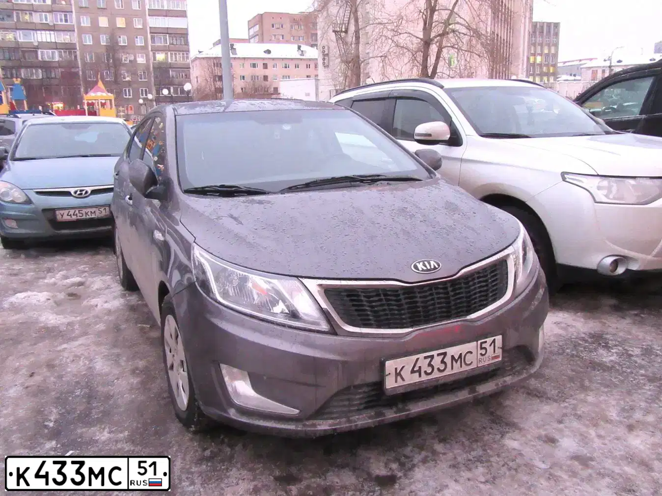 Фото автомобиля KIA RIO, 2014 — госномер А655СА51. Цвет: СЕРЫЙ