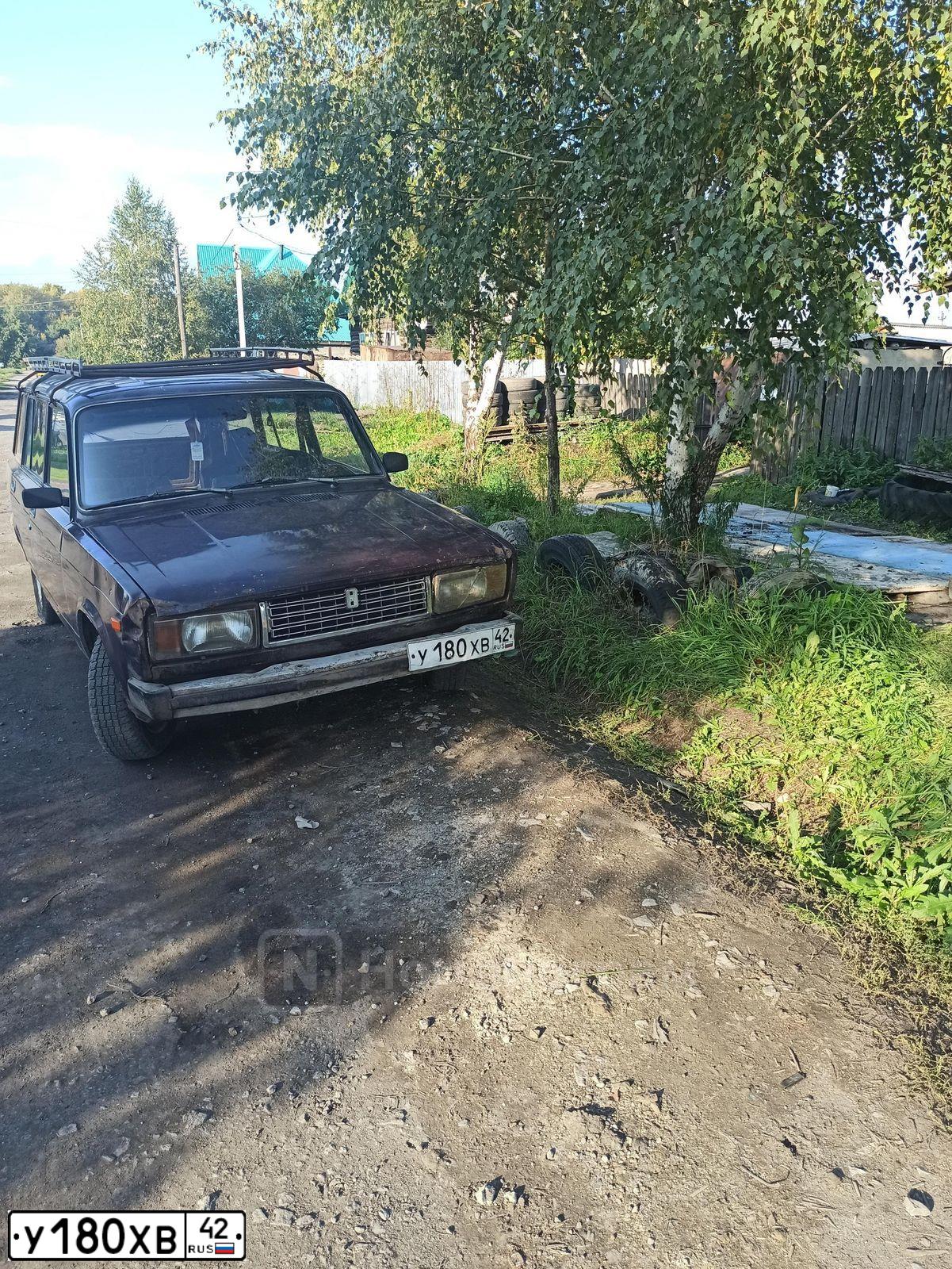 Фото автомобиля LADA 2104, 1997 — госномер У180ХВ42. Цвет: БАКЛАЖАННЫЙ