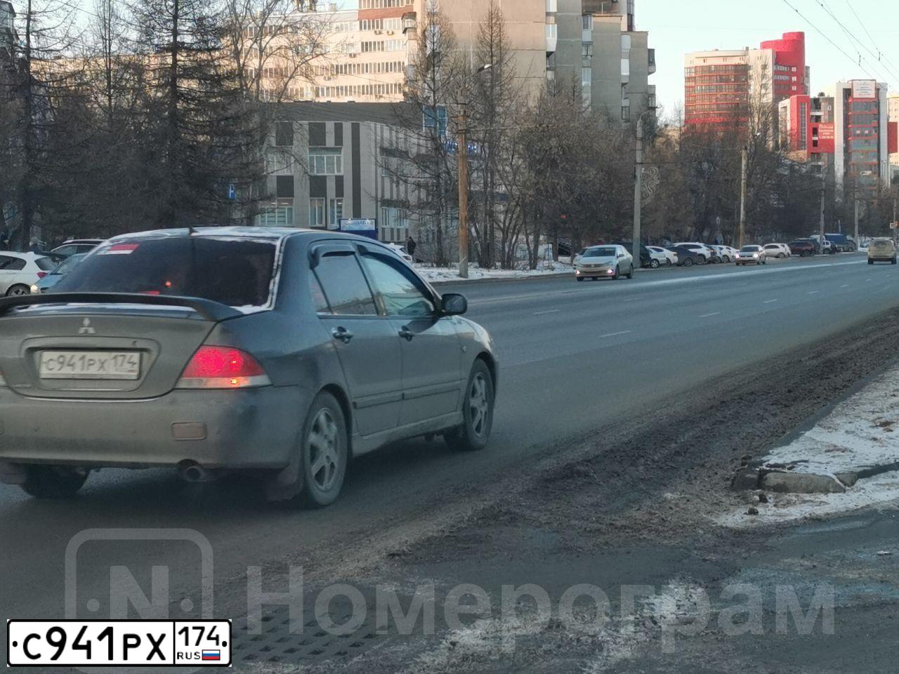 Фото автомобиля MITSUBISHI LANCER, 2004 — госномер С941РХ174. Цвет: СЕРЫЙ