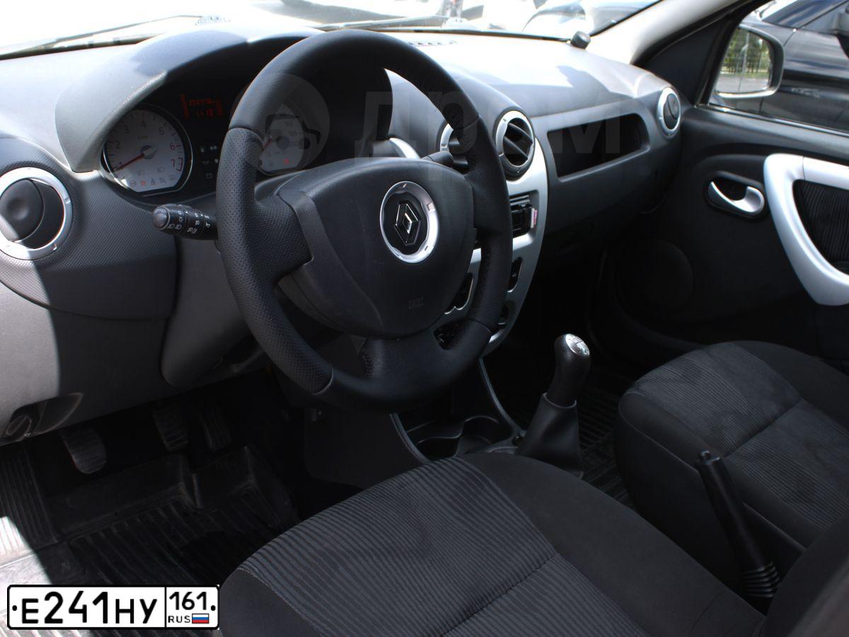 Фото автомобиля RENAULT LOGAN, 2011 — госномер Е241НУ161. Цвет: БЕЖЕВЫЙ