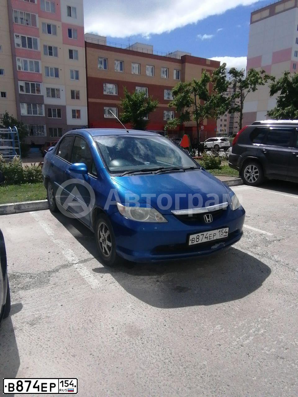 Фото автомобиля HONDA CITY, 2004 — госномер Т065ОР199. Цвет: СИНИЙ