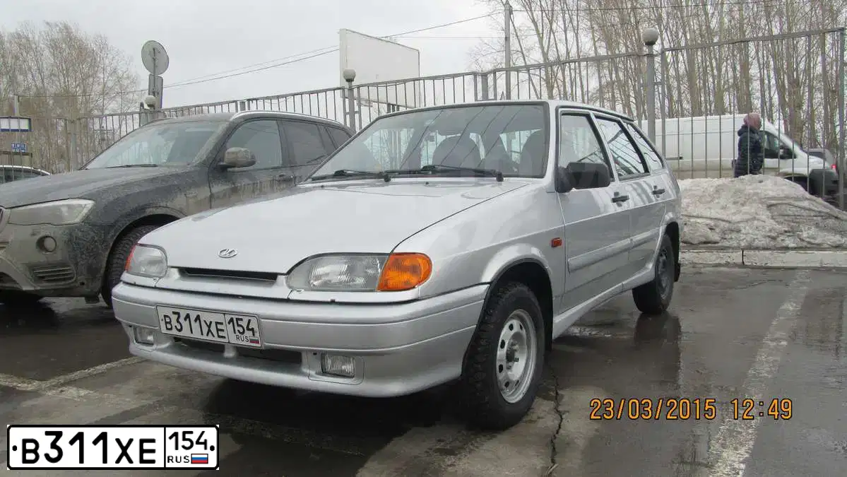 Фото автомобиля LADA 2114, 2013 — госномер Н100УС70. Цвет: СВЕТЛО СЕРЕБРИСТЫЙ МЕТАЛЛ