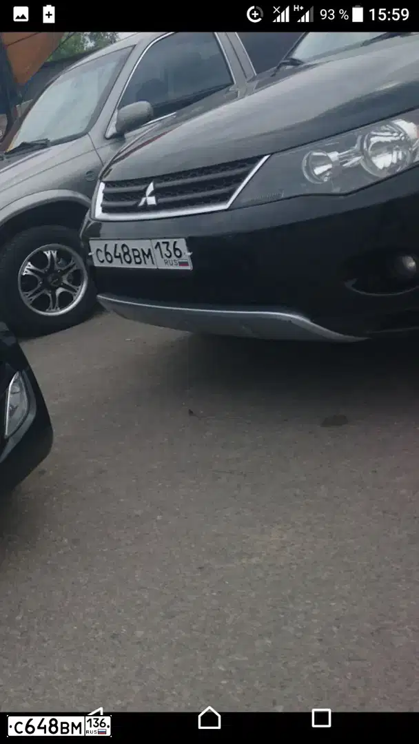 Фото автомобиля MITSUBISHI OUTLANDER, 2008 — госномер О340МО136. Цвет: ЧЕРНЫЙ