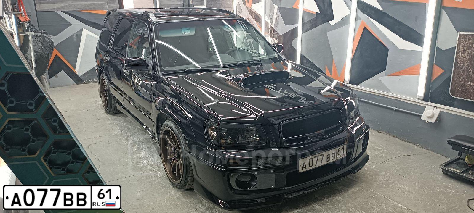 Фото автомобиля VOLKSWAGEN TRANSPORTER, 1995 — госномер А077ВВ61. Цвет: ВИШНЕВЫЙ