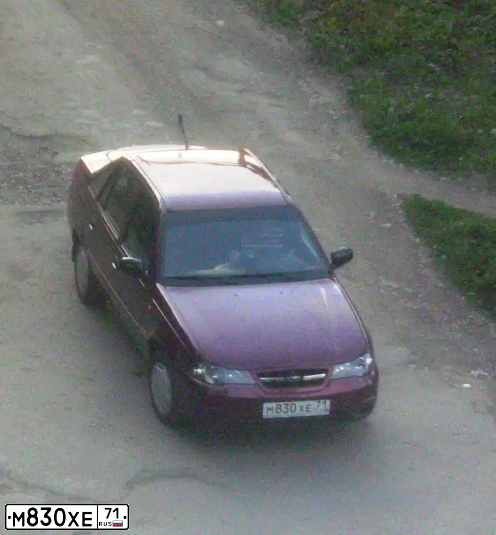 Фото автомобиля DAEWOO NEXIA, 2012 — госномер М387ЕХ136. Цвет: СПЕЛАЯ ВИШНЯ