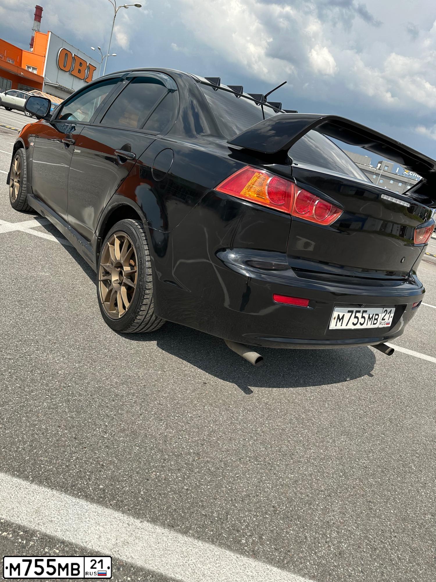 Фото автомобиля MITSUBISHI LANCER, 2008 — госномер С043АВ198. Цвет: ЧЕРНЫЙ
