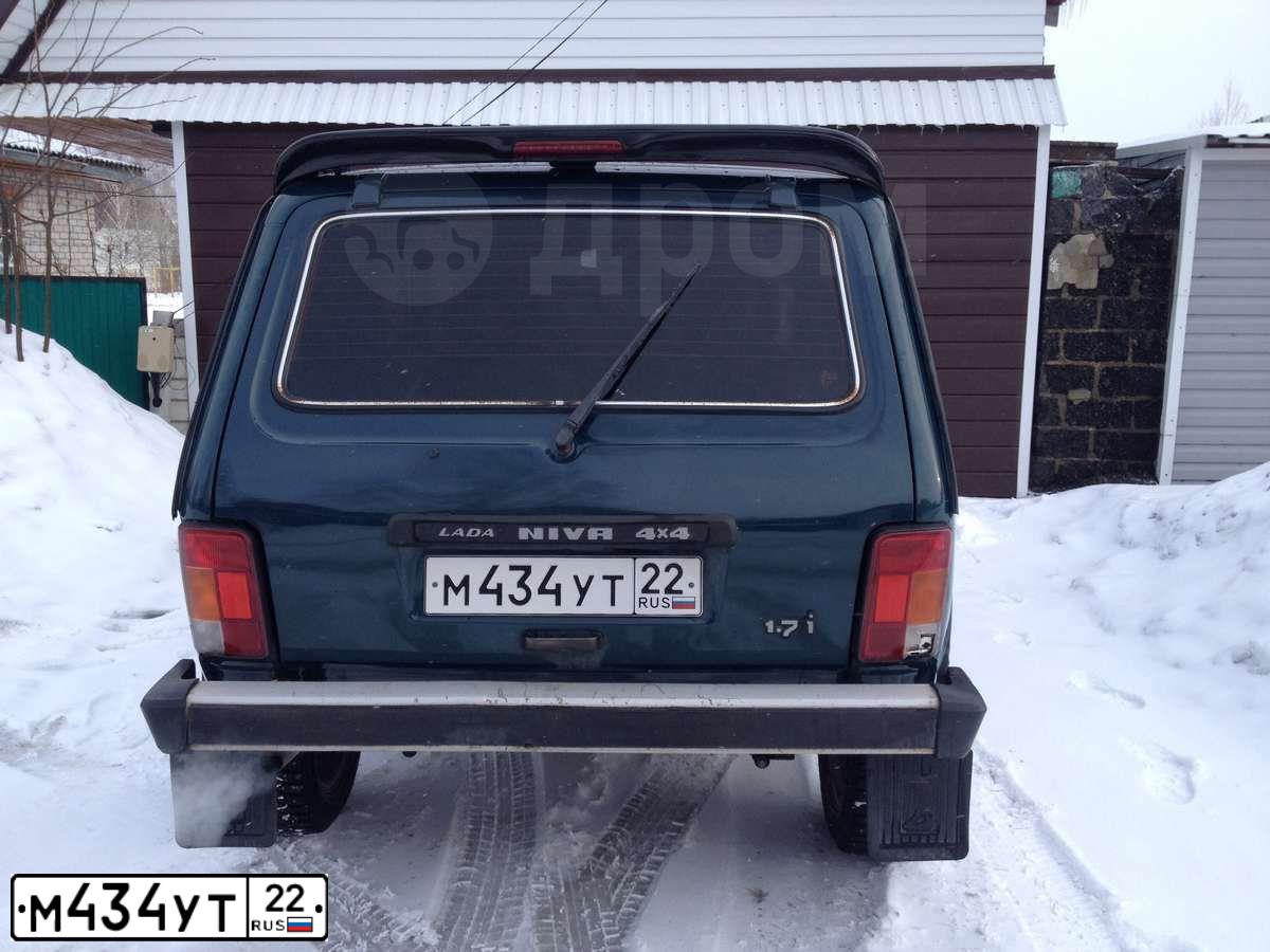 Фото автомобиля LADA 2121 NIVA, 2003 — госномер Р582УМ22. Цвет: сине-зеленый