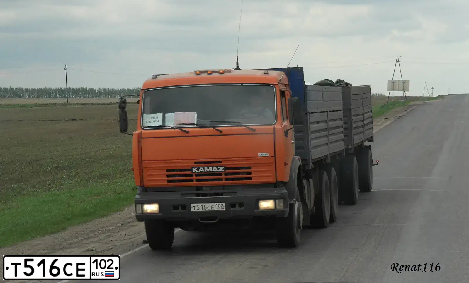 Фото автомобиля KAMAZ 65115 /6X4/, 2010 — госномер Т516СЕ102. Цвет: ОРАНЖЕВЫЙ