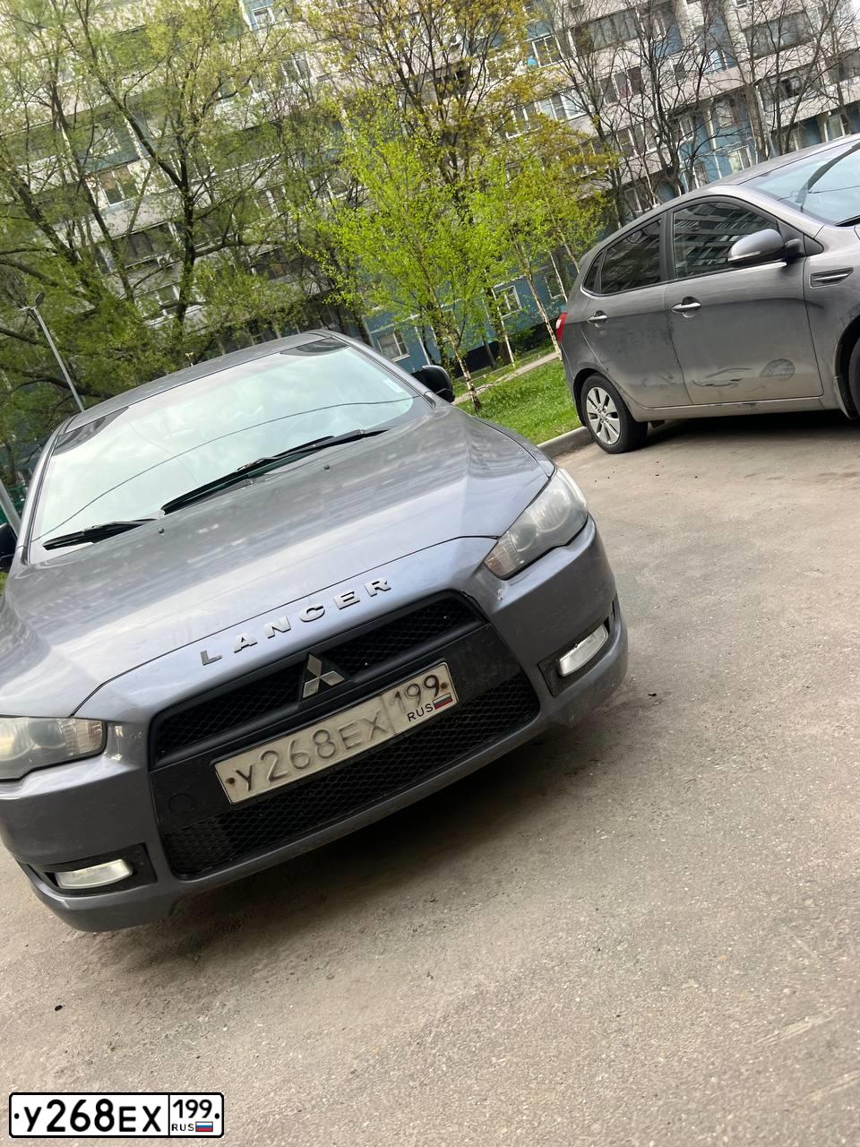 Фото автомобиля MITSUBISHI LANCER, 2008 — госномер У268ЕХ199. Цвет: Серый