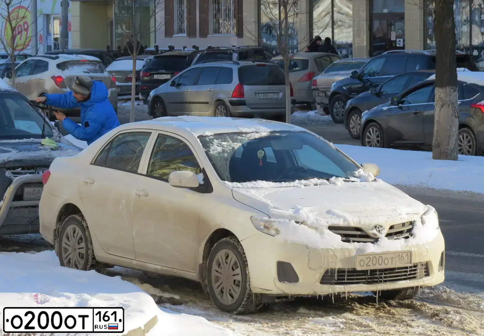 Фото автомобиля TOYOTA COROLLA, 2011 — госномер О200ОТ161. Цвет: БЕЛЫЙ