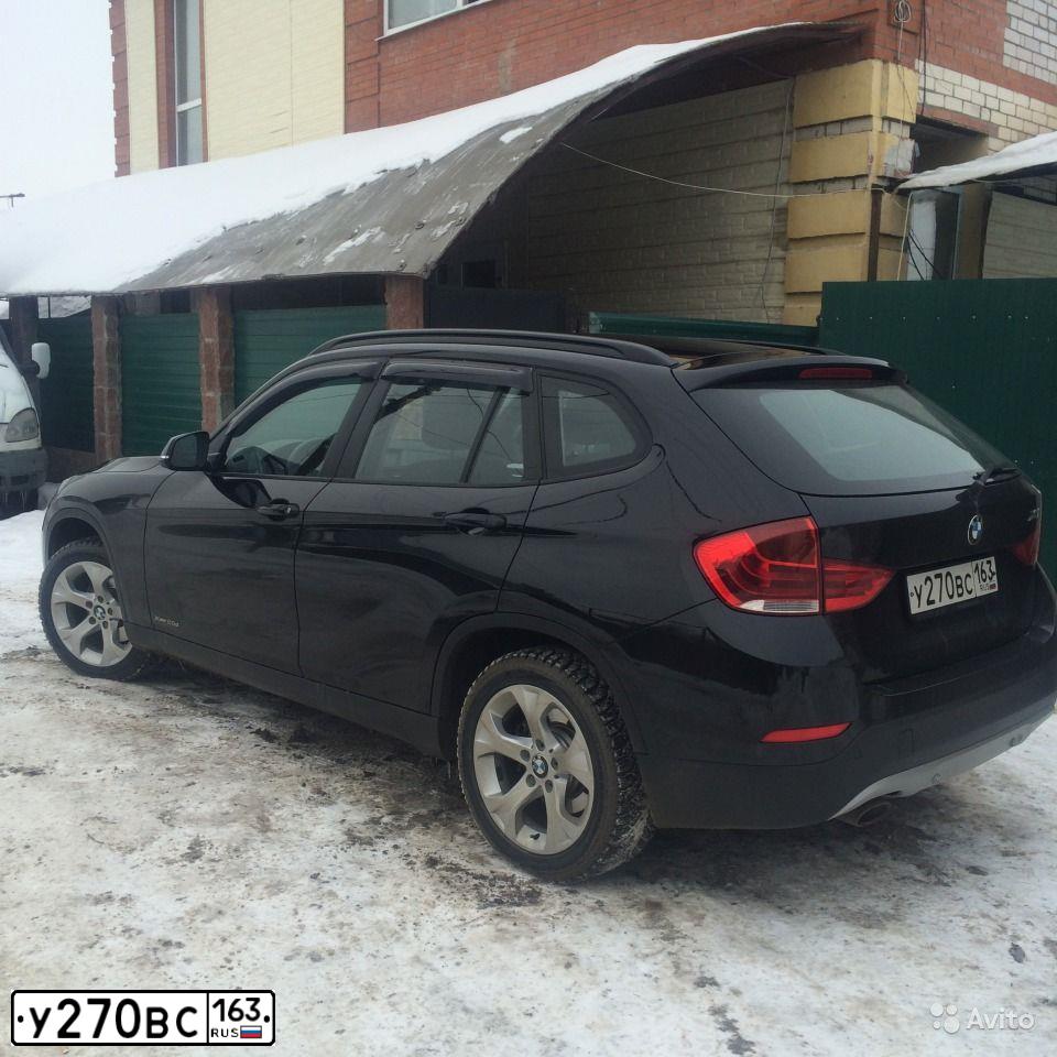 Фото автомобиля BMW X1, 2013 — госномер Х100ОВ23. Цвет: ЧЕРНЫЙ