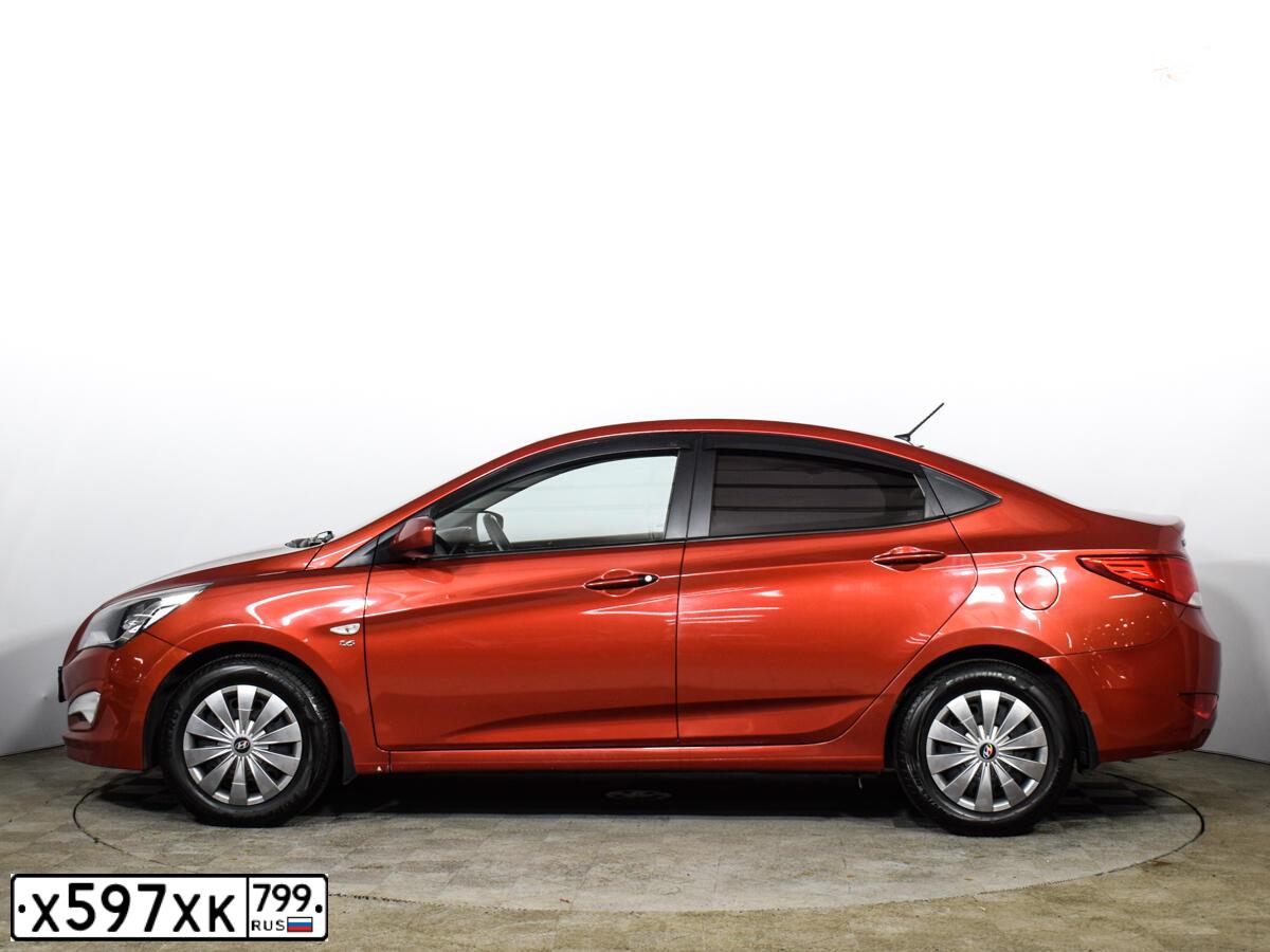 Фото автомобиля HYUNDAI SOLARIS, 2015 — госномер К512ОЕ790. Цвет: КРАСНЫЙ ГРАНАТ