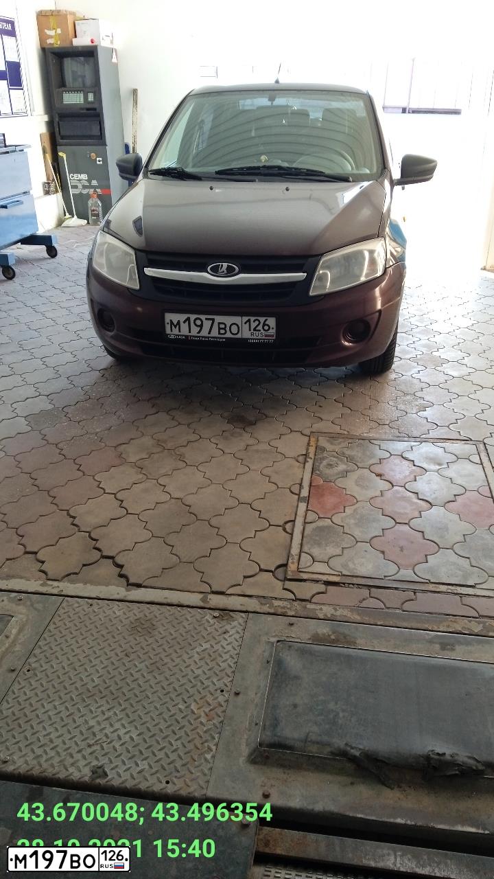 Фото автомобиля LADA 2190 GRANTA, 2012 — госномер С034ЕР163. Цвет: ТЕМНО-ВИШНЕВЫЙ