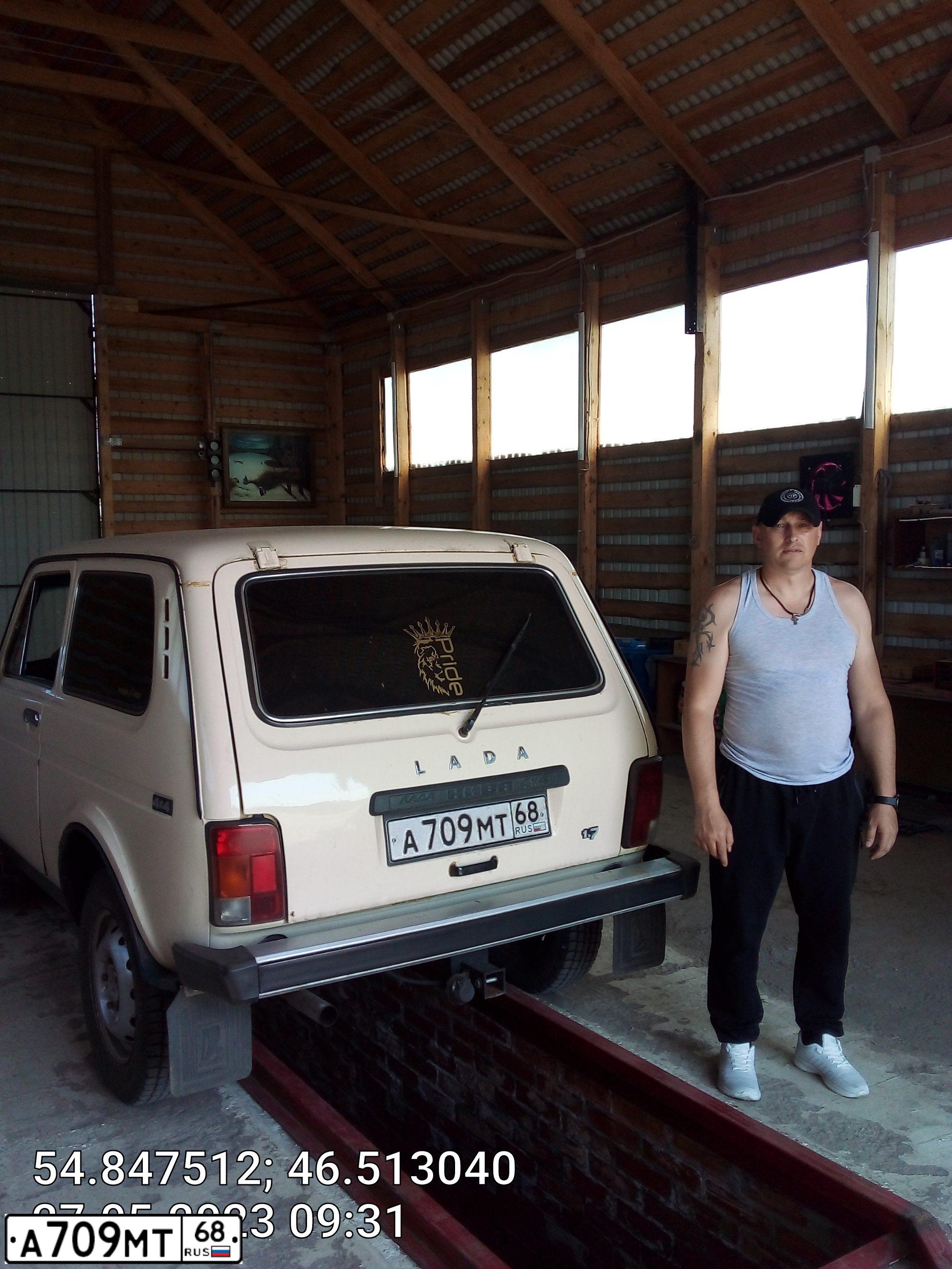 Фото автомобиля LADA 2121 NIVA, 1997 — госномер К795ХЕ21. Цвет: ЖЕЛТЫЙ