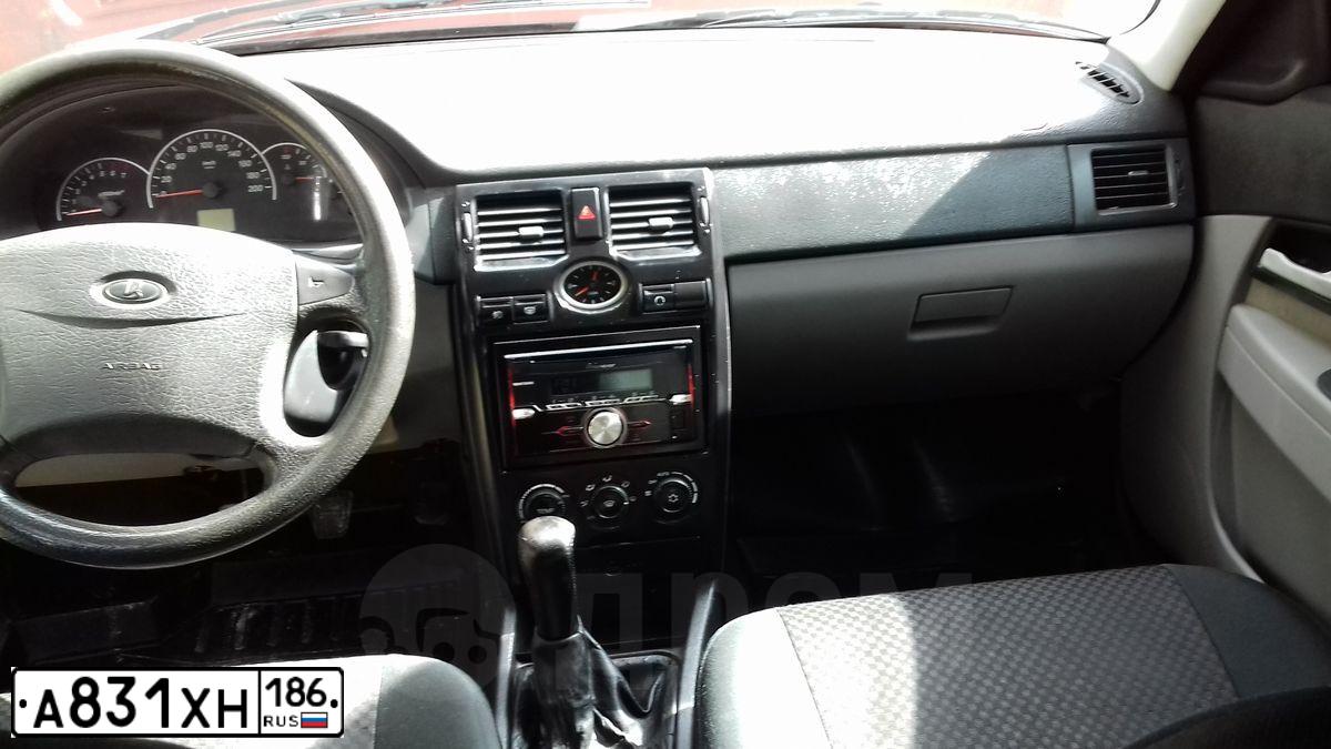 Фото автомобиля LADA 2172 PRIORA, 2010 — госномер К117КР186. Цвет: Сине-Черный
