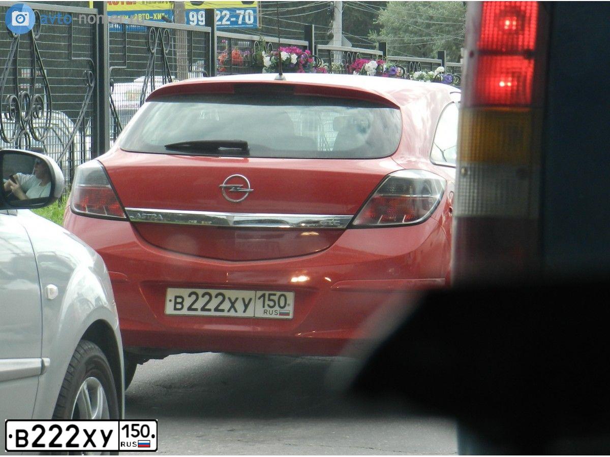 Фото автомобиля OPEL ASTRA, 2009 — госномер Е489МО07. Цвет: Красный