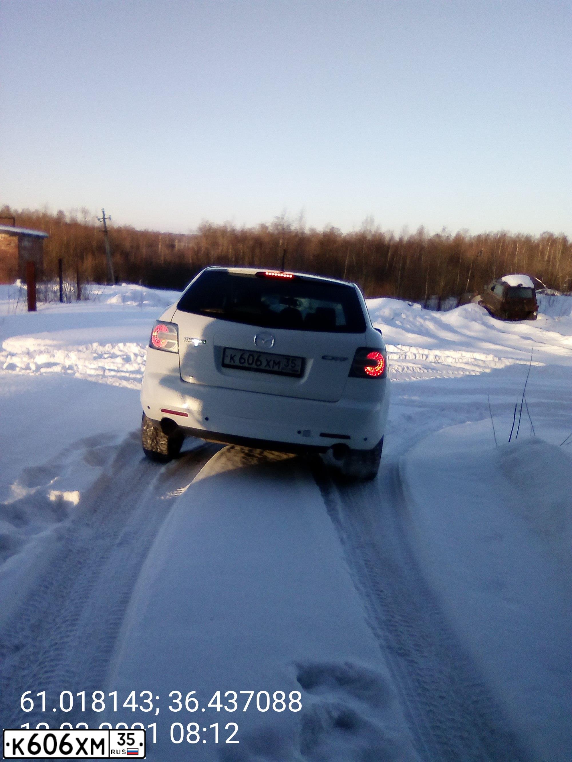 Фото автомобиля MAZDA CX-7, 2006 — госномер Н081ЕУ10. Цвет: Белый