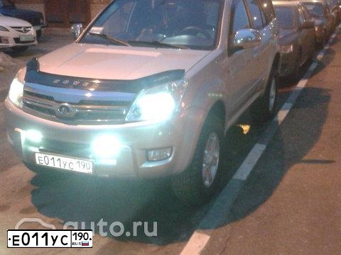 Фото автомобиля GAZ 3110 WOLGA, 2006 — госномер Е011УС190. Цвет: голубой