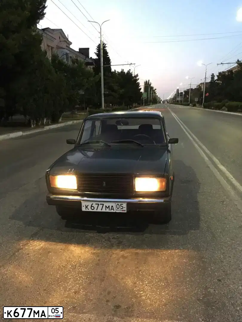 Фото автомобиля LADA 2107, 2007 — госномер К677МА05. Цвет: Темно-зеленый