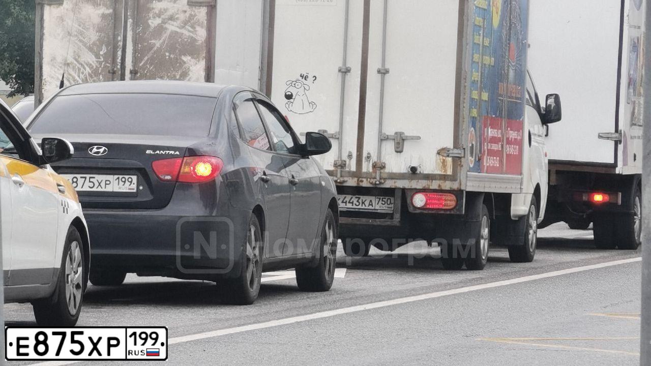 Фото автомобиля OPEL ASTRA, 2009 — госномер Е875ХР199. Цвет: ЧЕРНЫЙ