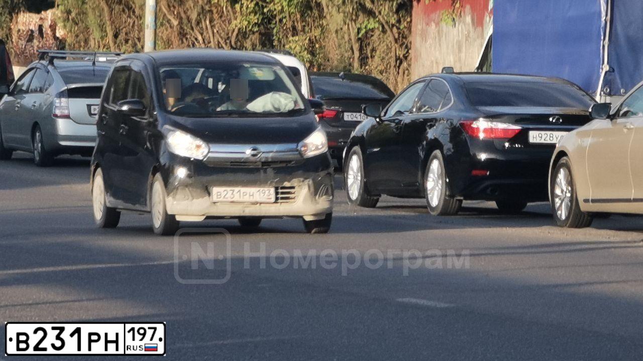 Фото автомобиля KIA VENGA, 2011 — госномер Р969НН136. Цвет: Коричневый
