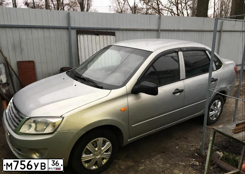 Фото автомобиля LADA 2190 GRANTA, 2012 — госномер М756УВ36. Цвет: серебристый