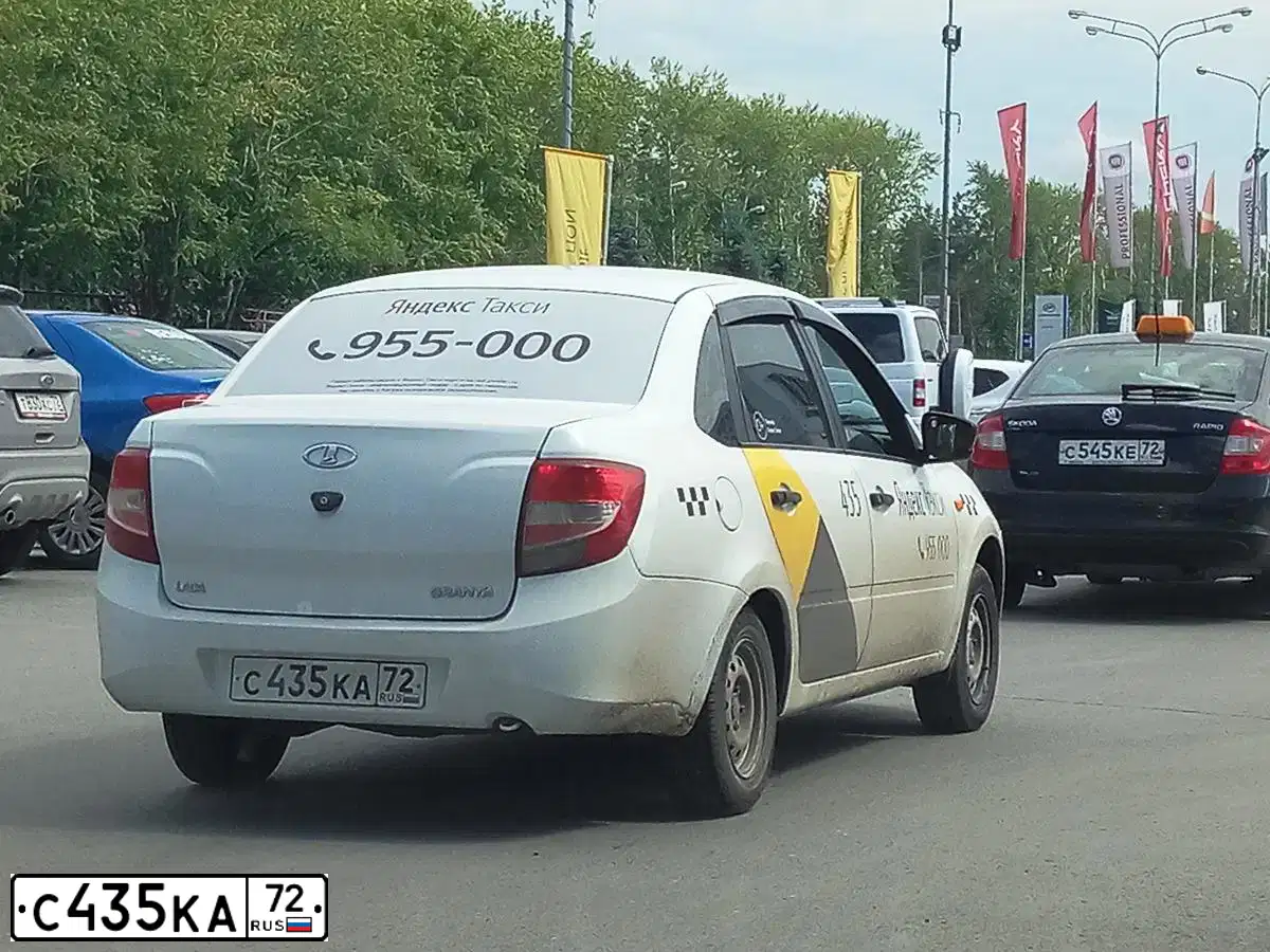 Фото автомобиля LADA 2190 GRANTA, 2016 — госномер Т290ЕН72. Цвет: БЕЛЫЙ