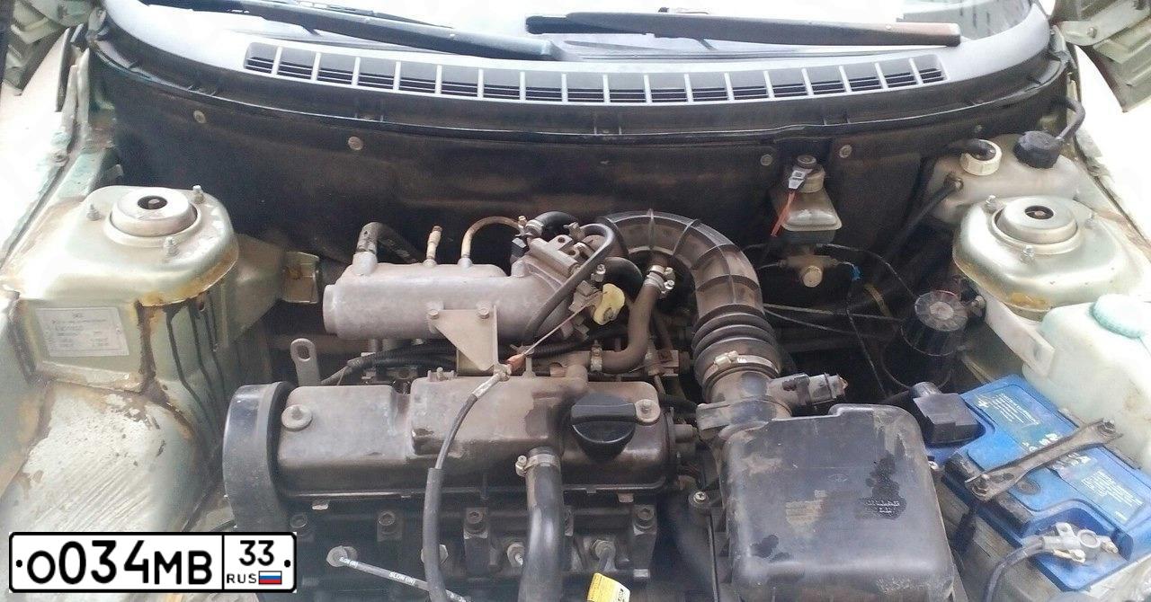 Фото автомобиля LADA 2110, 2001 — госномер О034МВ33. Цвет: Светло-зеленый