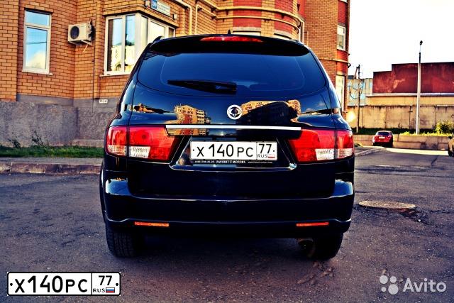 Фото автомобиля SSANGYONG KYRON, 2011 — госномер Х140РС77. Цвет: ЧЕРНЫЙ