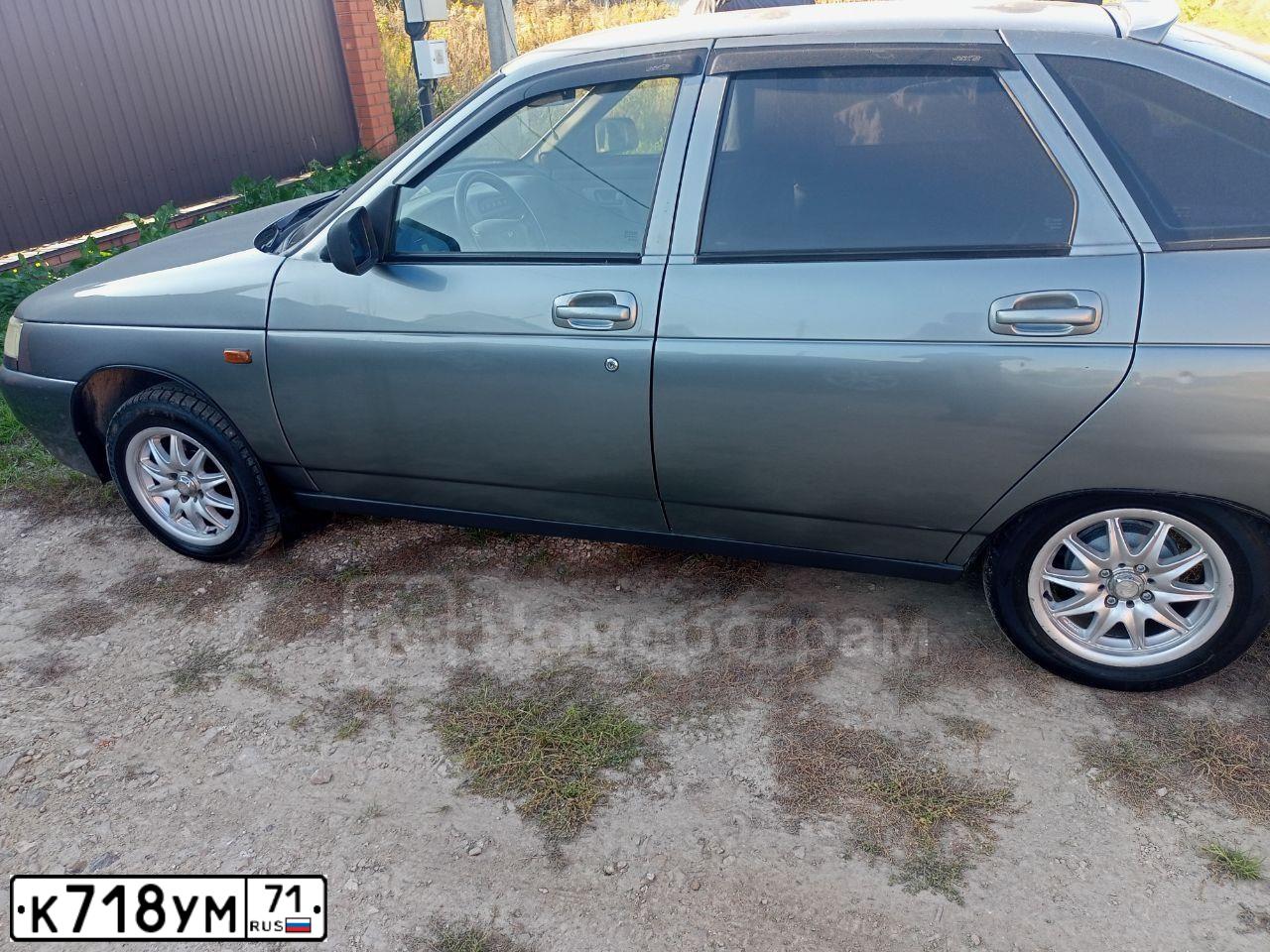 Фото автомобиля LADA 2112 LADA, 2007 — госномер К718УМ71. Цвет: СЕРО-ЗЕЛЕНЫЙ
