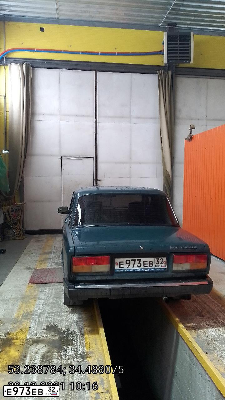 Фото автомобиля LADA 2107, 2005 — госномер Е973ЕВ32. Цвет: СИНЕ-ЗЕЛЕНЫЙ