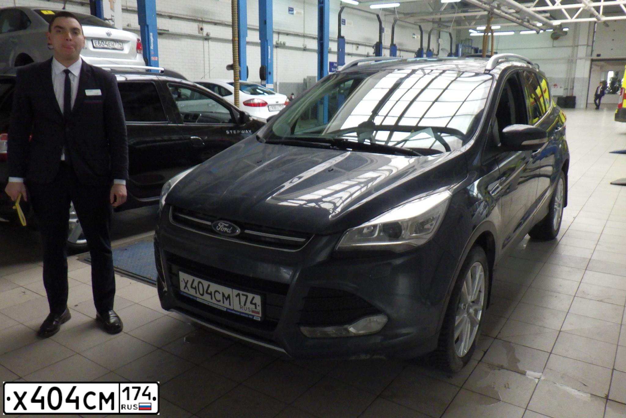 Фото автомобиля FORD KUGA, 2013 — госномер Х404СМ174. Цвет: ТЕМНО-СЕРЫЙ