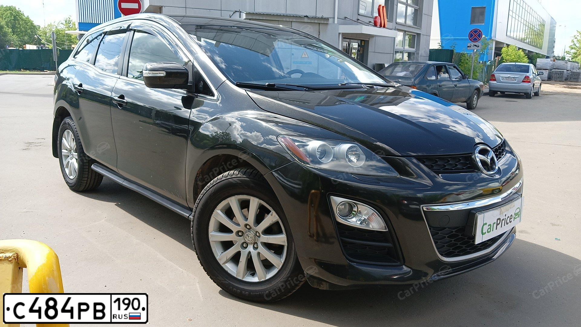 Фото автомобиля MAZDA CX-7, 2011 — госномер Р770АХ32. Цвет: ЧЕРНЫЙ