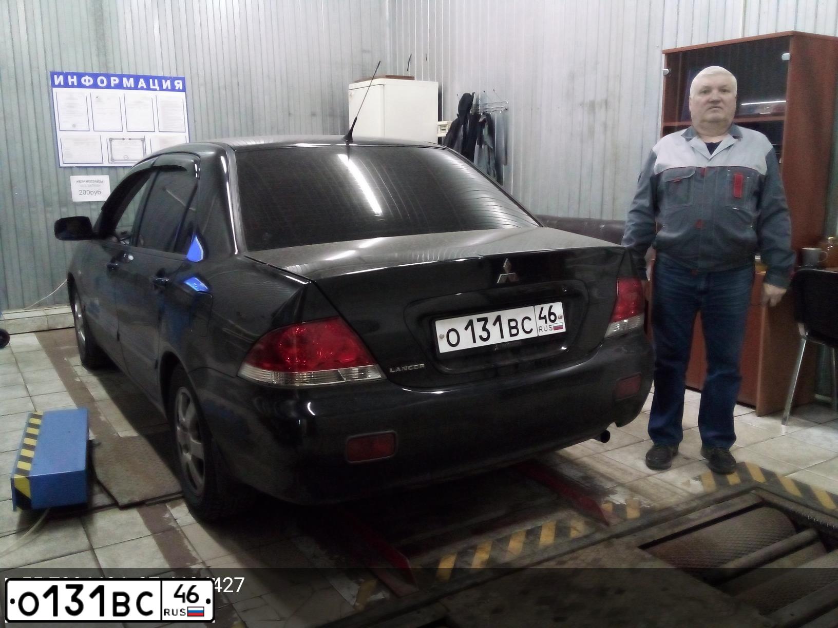 Фото автомобиля MITSUBISHI LANCER, 2007 — госномер Е044ТМ46. Цвет: ЧЕРНЫЙ