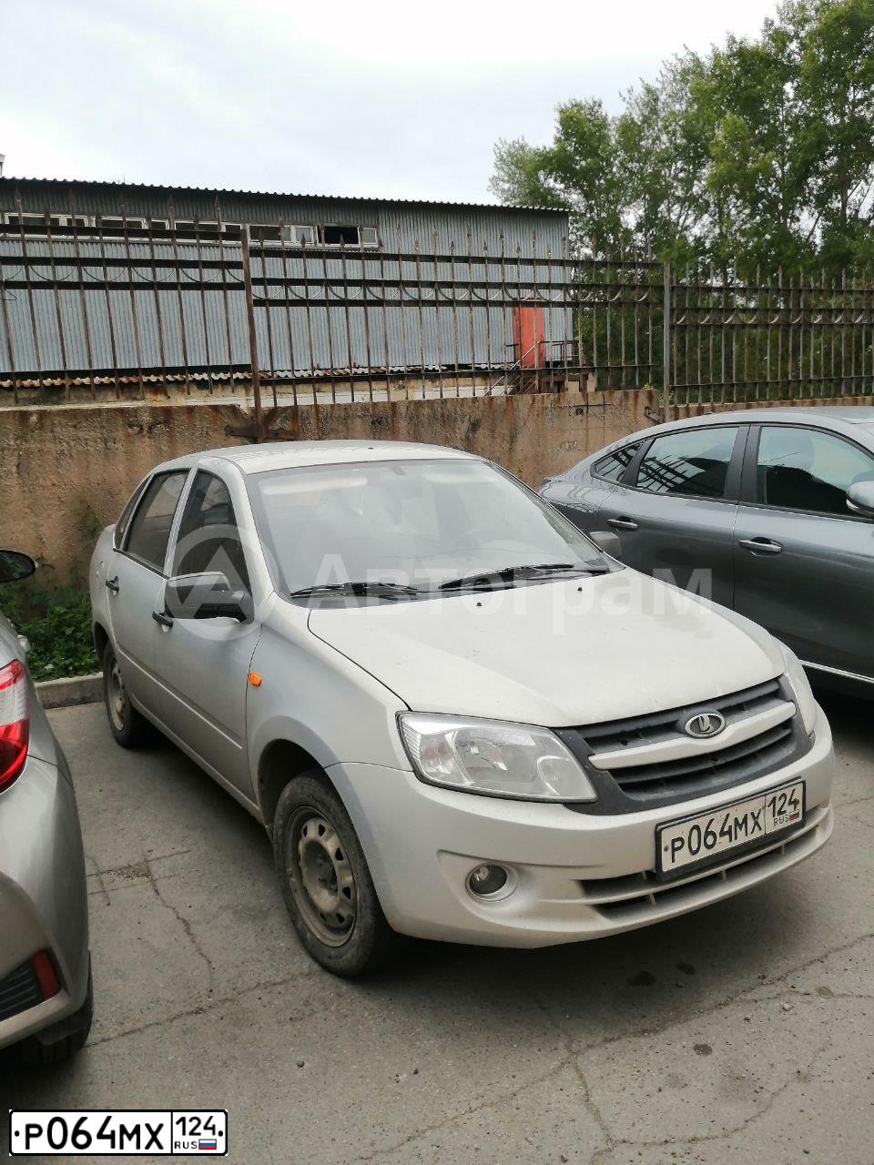 Фото автомобиля LADA 2190 GRANTA, 2014 — госномер С978НР138. Цвет: Серебристый