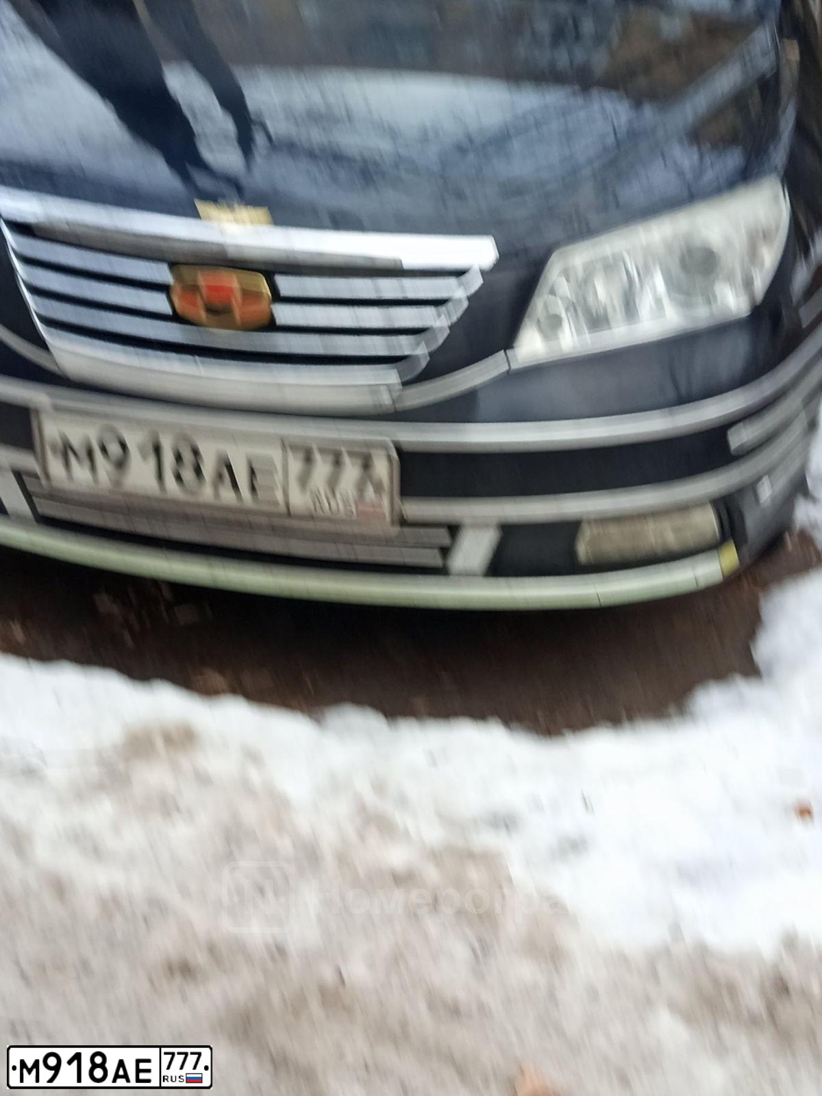 Фото автомобиля GEELY EMGRAND, 2012 — госномер М918АЕ777. Цвет: ЧЕРНЫЙ
